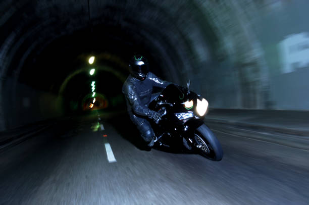 istock Motorcycle Racing Through Tunnel at Night 111862990