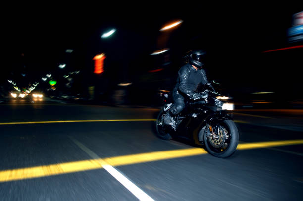 istock Motorcycle Speeding through City at Night 111863013