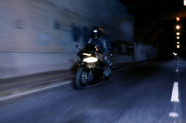 istock Motorcycle Speeding through Tunnel at Night 111863312