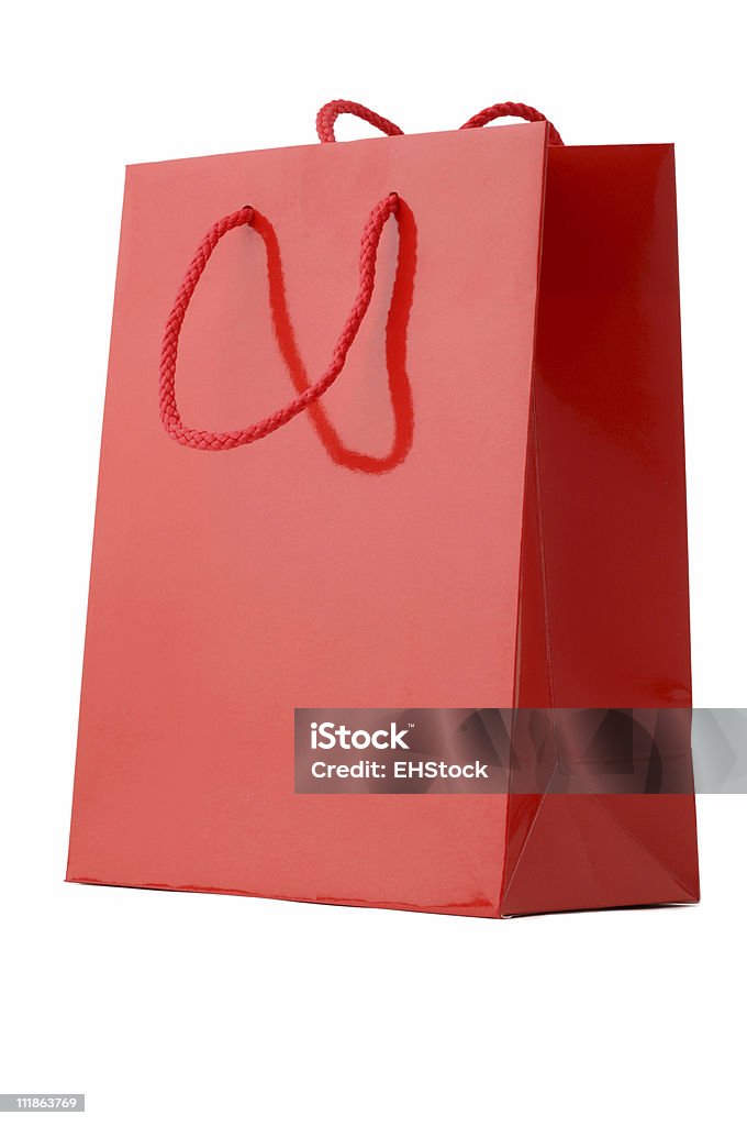 Bolsa de compras navideñas rojo aislado sobre fondo blanco - Foto de stock de Blanco - Color libre de derechos