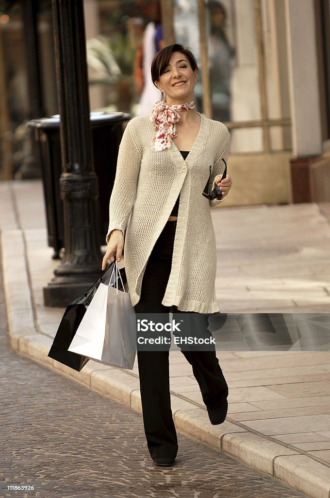 Woman Shopping On Rodeo Drive With Bags Stock Photo - Download Image Now -  Retail, Shopping, Walking - iStock