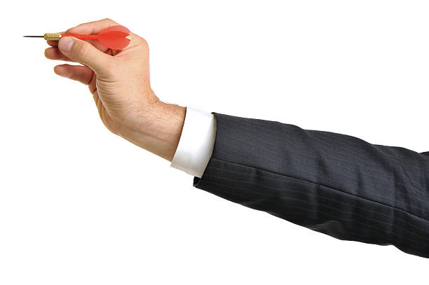 istock Businessman's Arm Throwing Dart on White 111866559