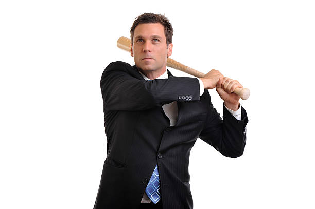 istock Businessman Swinging Baseball Bat Isolated on White Background 111867435