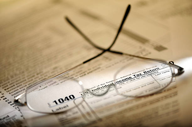 istock Eyeglasses on 1040 Tax Return 111878002