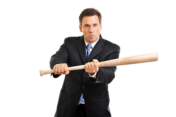 ビジネスマンホオジロ、白で野球のバット - bunt ストックフォトと画像