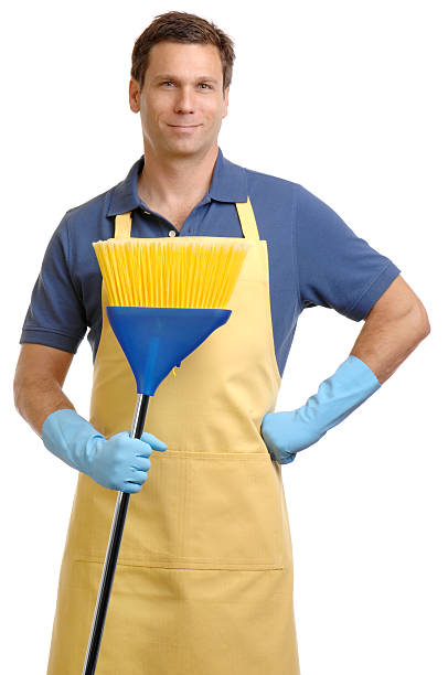 istock House Husband in Apron with broom 111885310