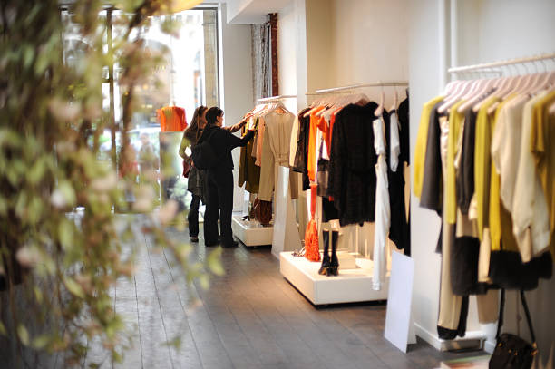 Women Boutique Dress Shopping in Paris France stock photo