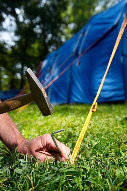 istock Fixing of blue tent in camp 111897890
