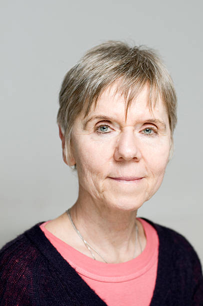 istock mature woman portrait neutral 111910990