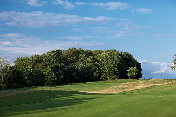 istock Beautiful golf hole on a sunny summer early evening. 111912146