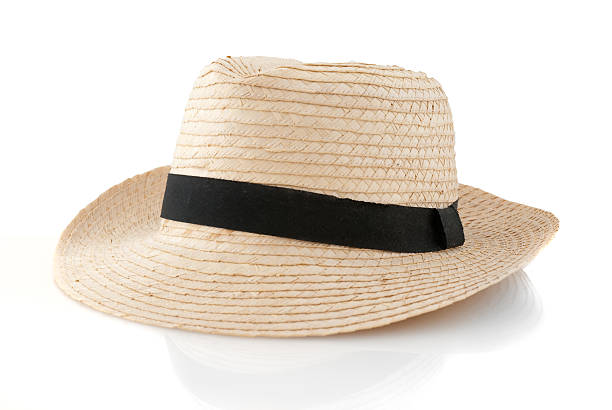Straw hat withe black ribbon Straw hat withe black ribbon isolated on white background. sun hat stock pictures, royalty-free photos & images