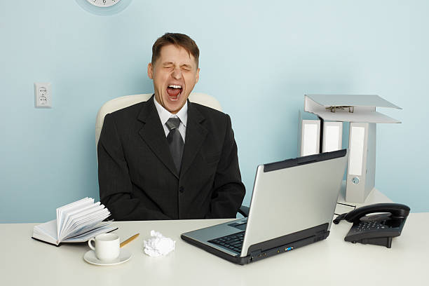istock Businessman yawning from boredom and idleness 111917263