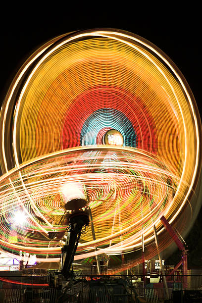 istock Motion Blurred Ferris Wheel at Amusement Park 111918020