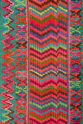 Guatemala Handwoven on a traditional backstrap loom, the Huipil, cotton shirt, is the most important Mayan womens clothing item and an important part of Mayan identity. The design varies from village to village. This textile is from Todos Santos, Guatemala. Most huipil designs are found in Guatemala some in southern Mexico. The fabric is made in two panels and is uneven.