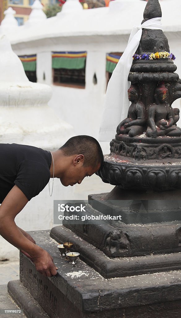 Buddhist prayer at Boudhanath stupa  Bodnath Stupa Stock Photo