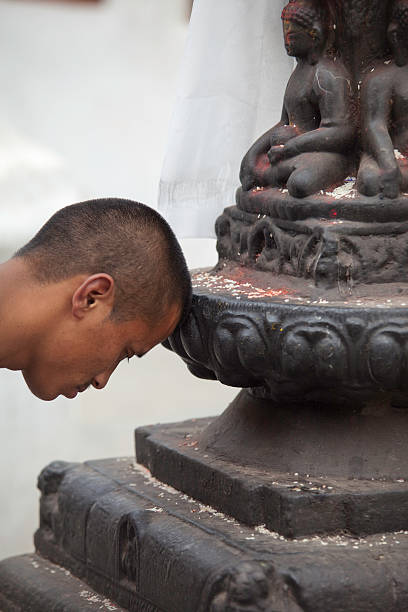 istock Buddhist prayer at Boudhanath stupa closeup 111919591