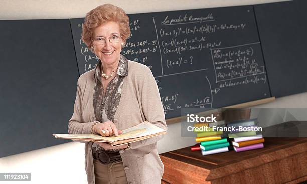 Friendly Mature Teacher Stock Photo - Download Image Now - Classroom, Smiling, Teacher