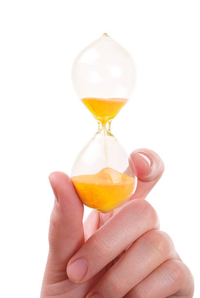 istock The female hand holds a sand-glass 111924041