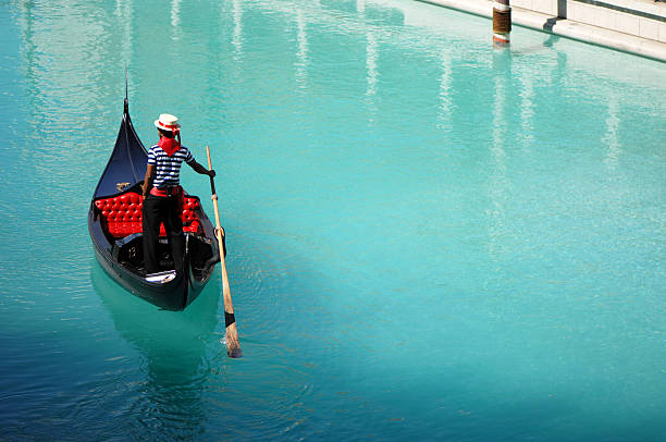 Venetian Gondola at Las Vegas Hotel Tourist Attraction A gondolier meanders through the canals of Vegas gondolier stock pictures, royalty-free photos & images