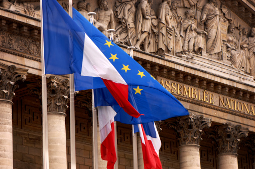 European flag with a robot hand with a jigsaw puzzle .