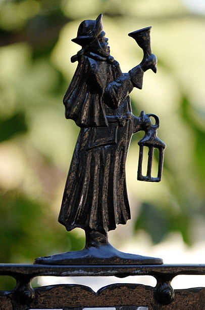 Bell Ringer A figure above a mailbox town criers stock pictures, royalty-free photos & images