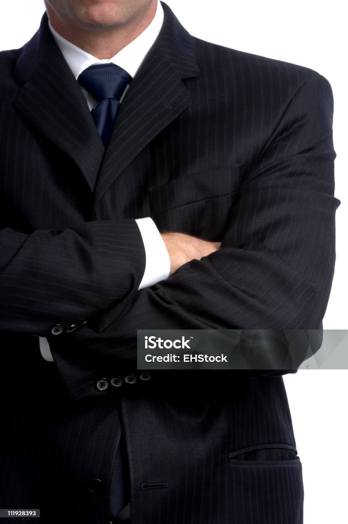 Hombre de negocios con los brazos cruzados aislado sobre fondo blanco - Foto de stock de Portero de seguridad libre de derechos