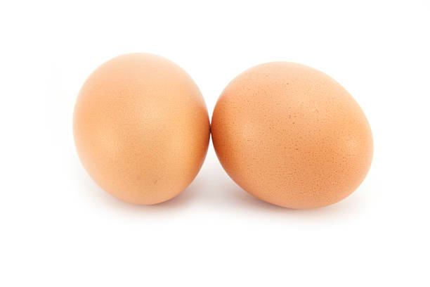 Dois ovos em branco - fotografia de stock