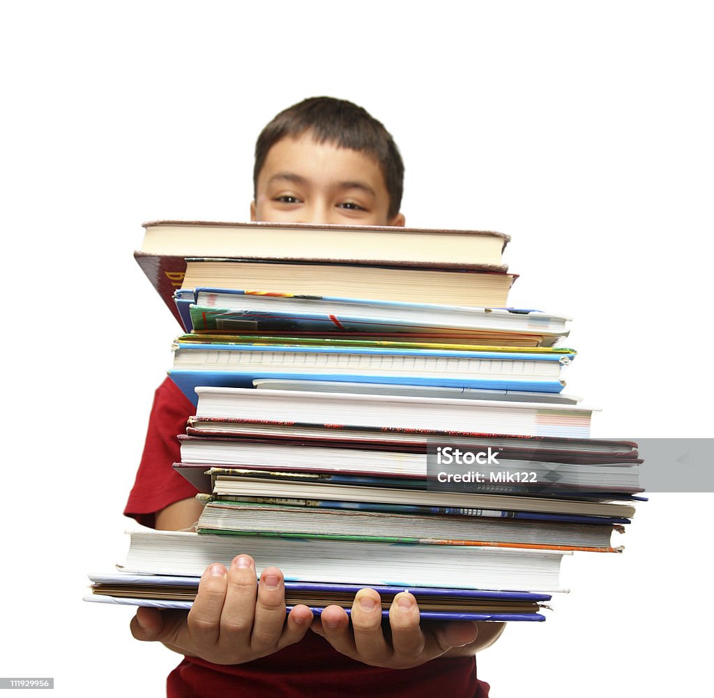 asian boy with stack of books  Book Stock Photo