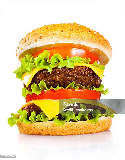 Sabrosa Hamburguesa Y Apetitosa En Un Blanco Foto de stock y más banco de imágenes de Alimento - Alimento, Amarillo - Color, Bistec