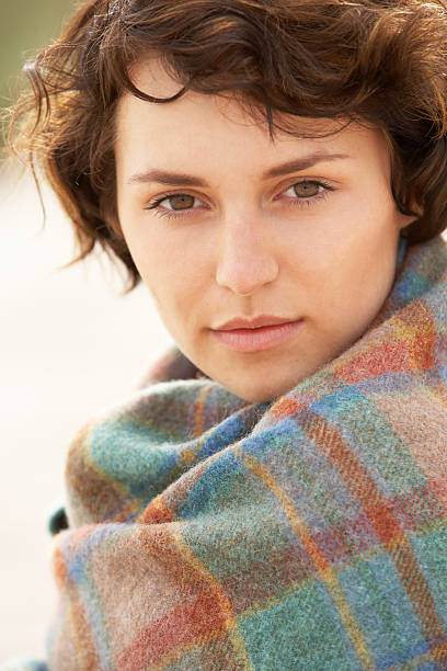 istock Young Woman Standing In Sand Dunes 111931448