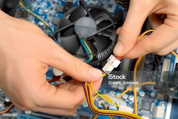 Working On Computer Parts Stock Photo - Download Image Now - Color Image, Computer, Computer Cable