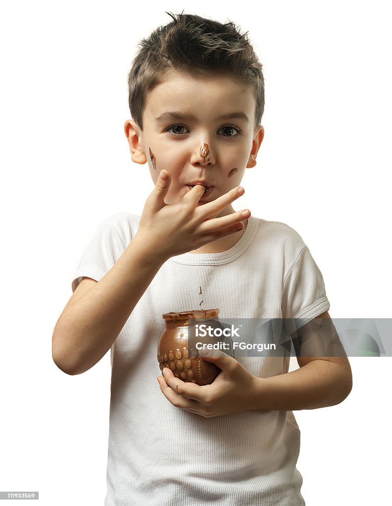 Ragazzo carino che Adora il cioccolato - Foto stock royalty-free di Cioccolato