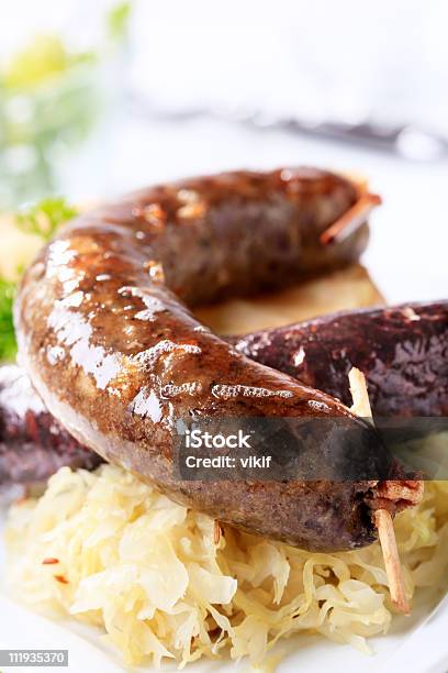 Sausages And Sauerkraut Stock Photo - Download Image Now - Black Pudding, Cabbage, Color Image