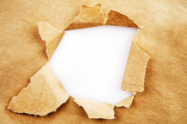 Ripped paper  torn brown paper stock pictures, royalty-free photos & images