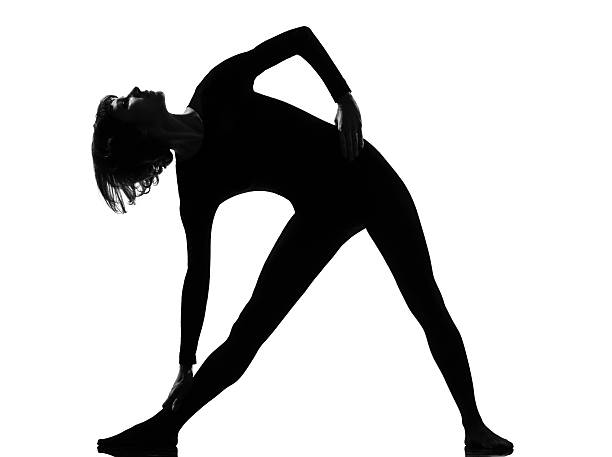 istock utthita trikonasana triangle pose position woman 111941426