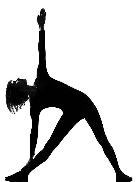istock utthita trikonasana triangle pose position woman 111941428