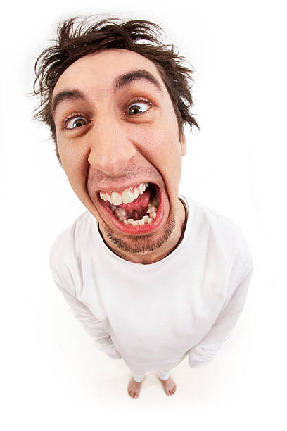 Lunatic Fish eye shot of screaming insane man in strait-jacket in isolation ugly people crying stock pictures, royalty-free photos & images