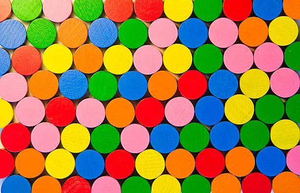 istock Colourful round wooden tokens 111944680