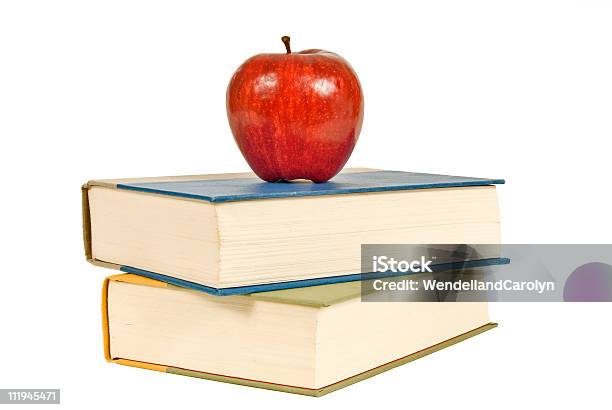 Two Books And An Apple Stock Photo - Download Image Now - Apple - Fruit, Book, Close-up