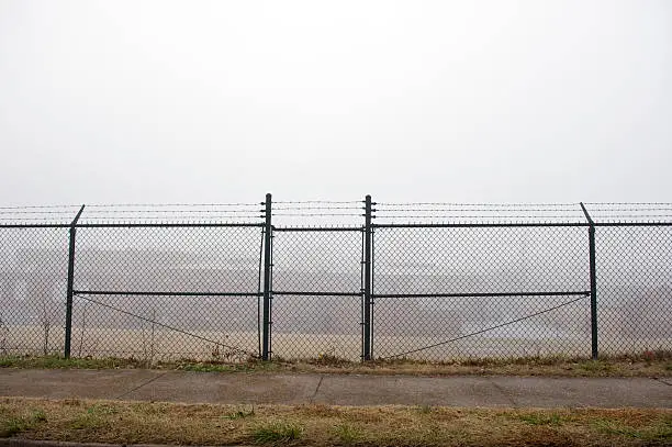 Photo of Behind Barbed Wire