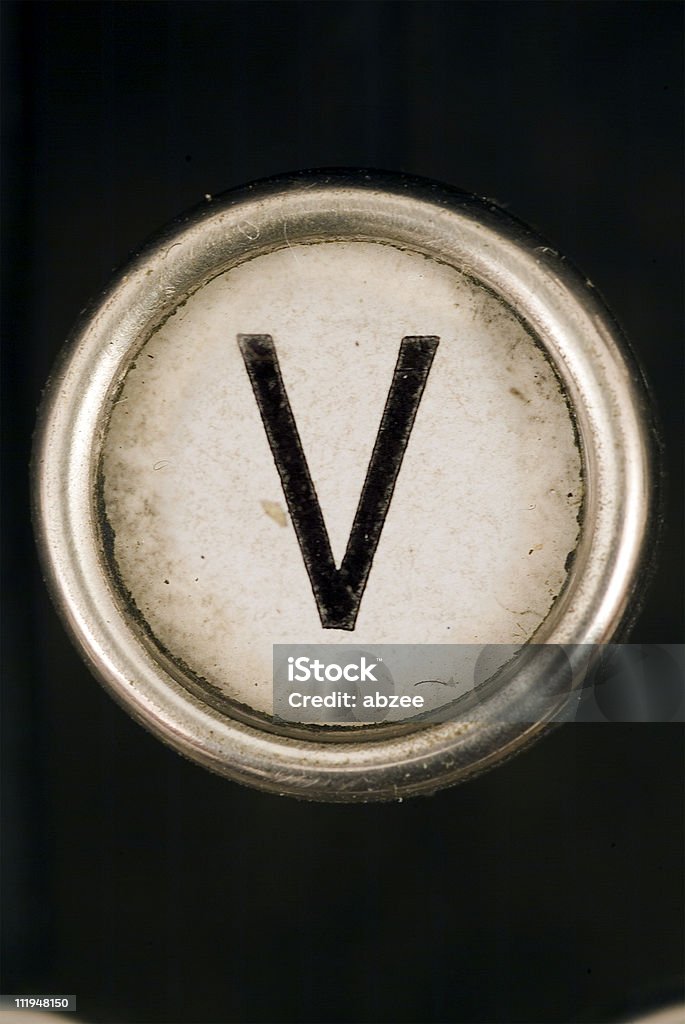 V キーのフルのアルファベットから grungey タイプライター - アルファベットのロイヤリティフリーストックフォト