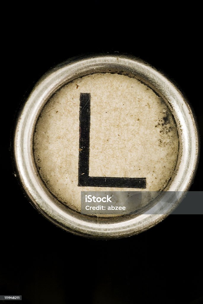 L clé d'une lettre de L'alphabet de grungey machine à écrire - Photo de Blanc libre de droits