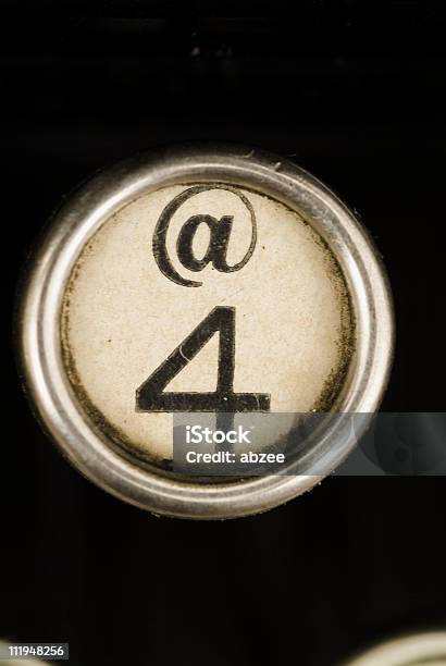 The 4 Key From An Antique Typewriter Stock Photo - Download Image Now - 'at' Symbol, Typebar, Alphabet