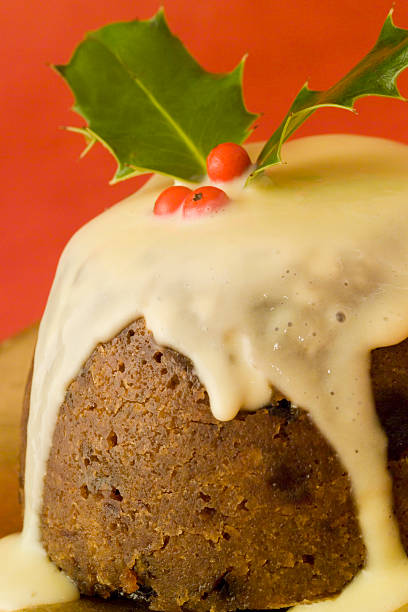 istock Christmas pudding with sauce,close up 111948709