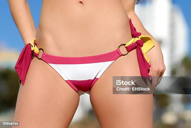 Pink And White Bikini Bottoms At Beach Stock Photo - Download Image Now - Bikini, Teenage Girls, Close-up