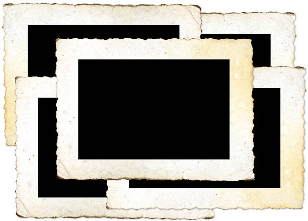 istock Old crinkle edged photos arranged on white backround 111950231