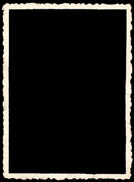 istock Old crinkle edged photo on black backround 111950443