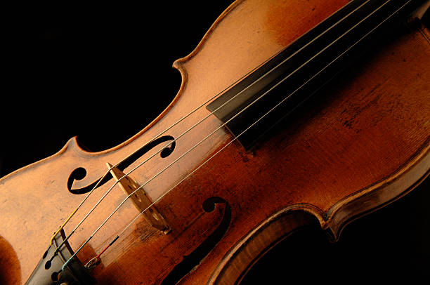 istock Antique Violin Cropped on Black 111950749
