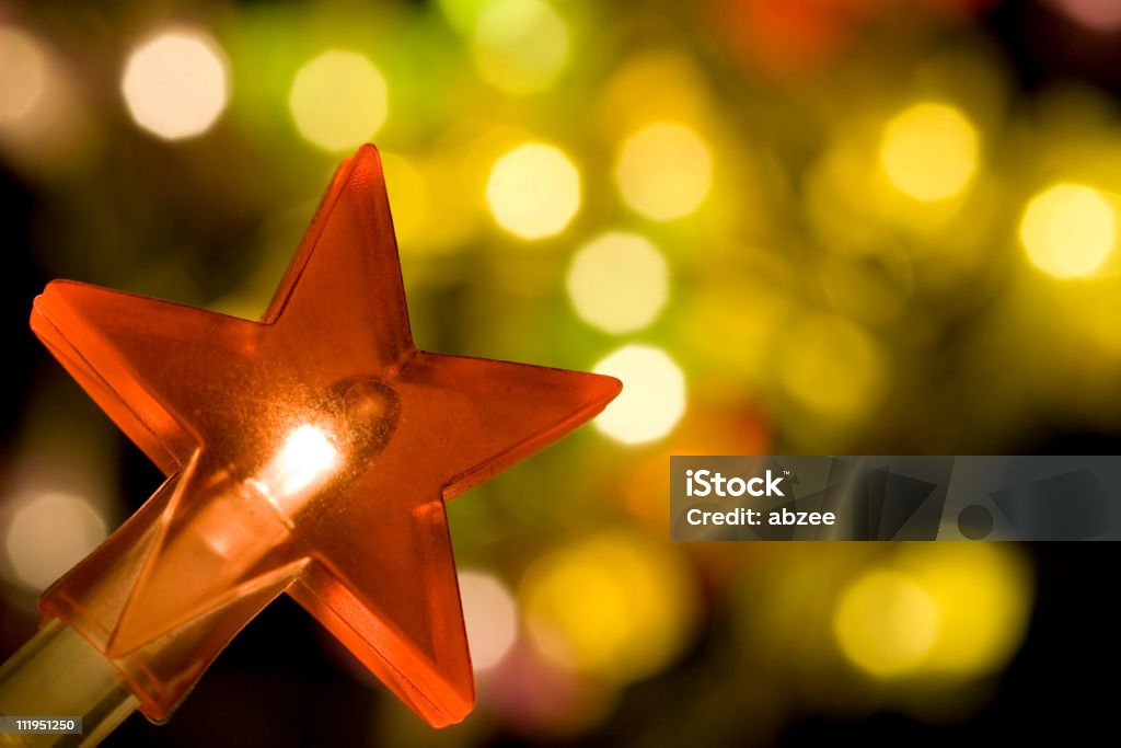 Blurred Christmas tree lights and a star light All my Festive Imagery, click here! Celebration Stock Photo