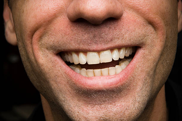 istock Close Up of a Man Smiling with Stubble 111952370